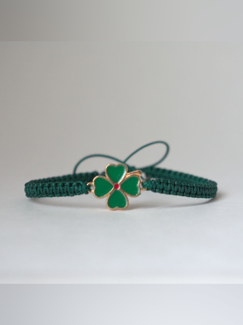 Green Four-Leaf Clover Cord Bracelet with Gold Accent
